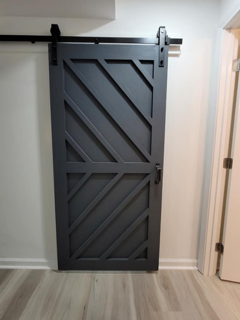Indoor barn door, custom designed and made by the Homeowners Helper