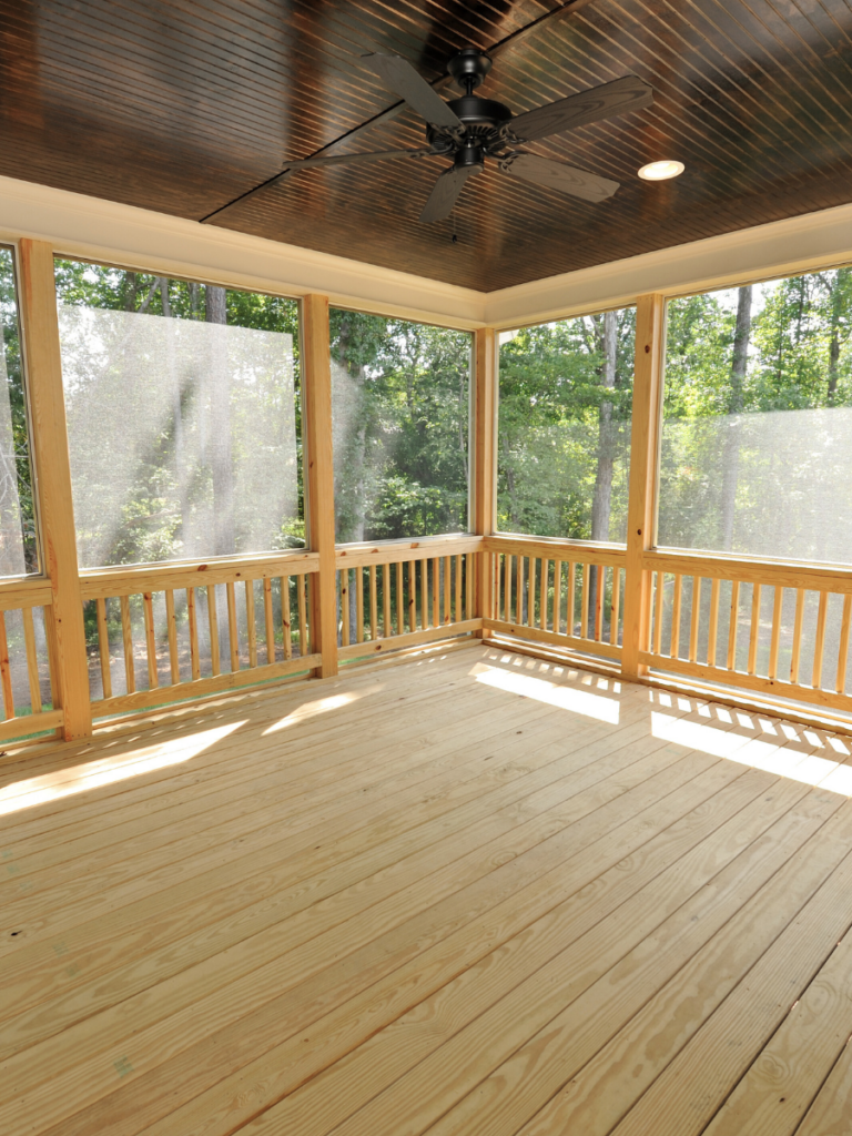 Example of a screened porch with oak decking by the homeowners helper, deck builders in frederick md
