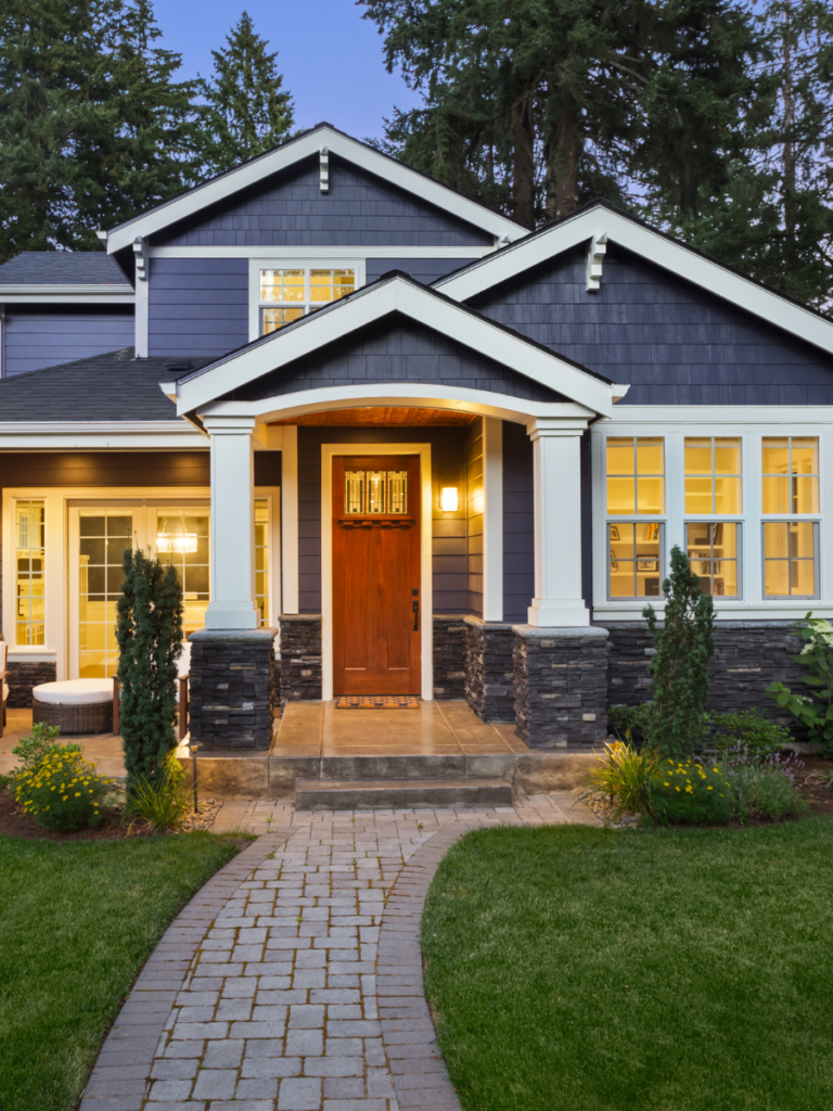 Modern home with horizontal blue siding and blue cedar siding accents