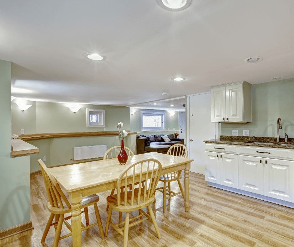 Example of a basement apartment with full kitchen, dining area, and living room