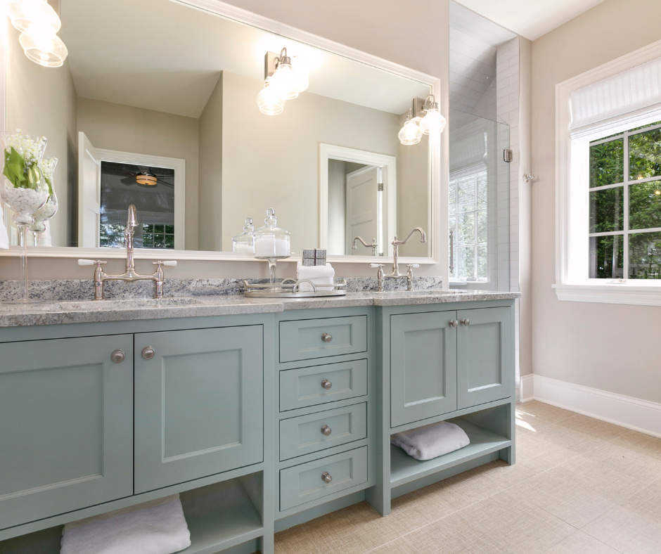 example of a traditional luxutry bathroom vanity with granite countertops and custom cabinetry