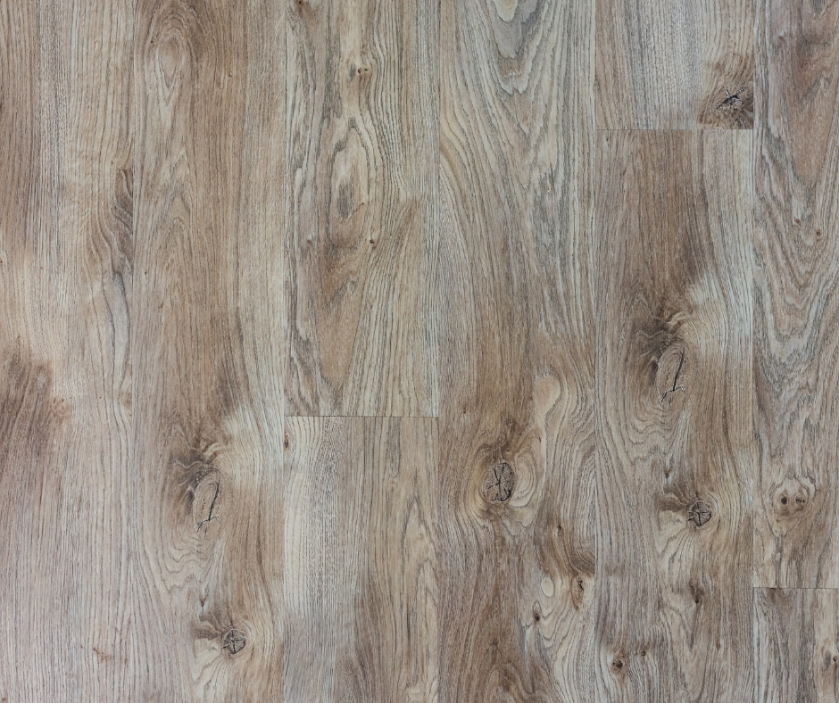 A closeup of luxury vinyl flooring created to look like natural wood flooring